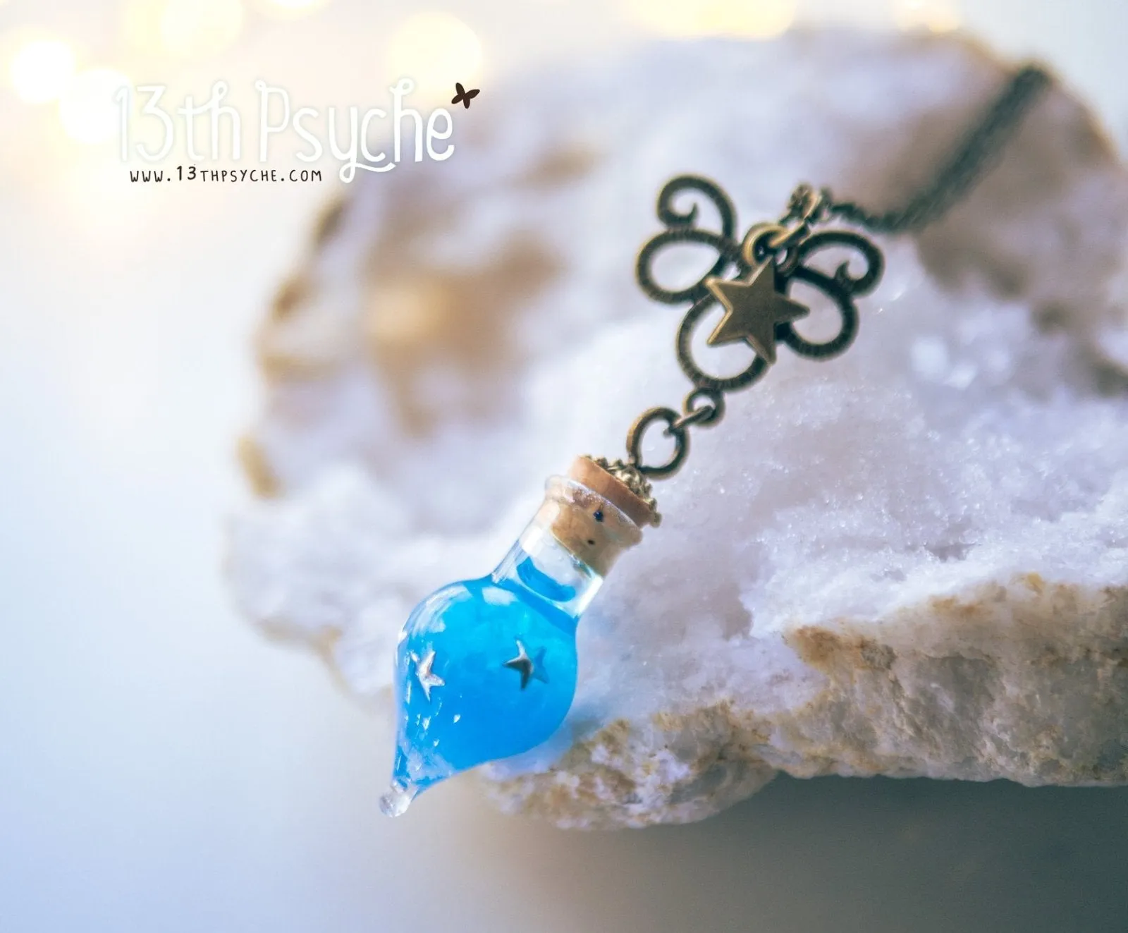 Glow in the dark blue teardrop vial pendant necklace