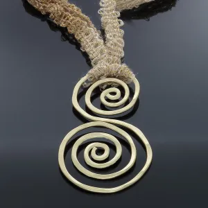 Gold Double Spiral abstract necklace on adjustable yarn/ribbon