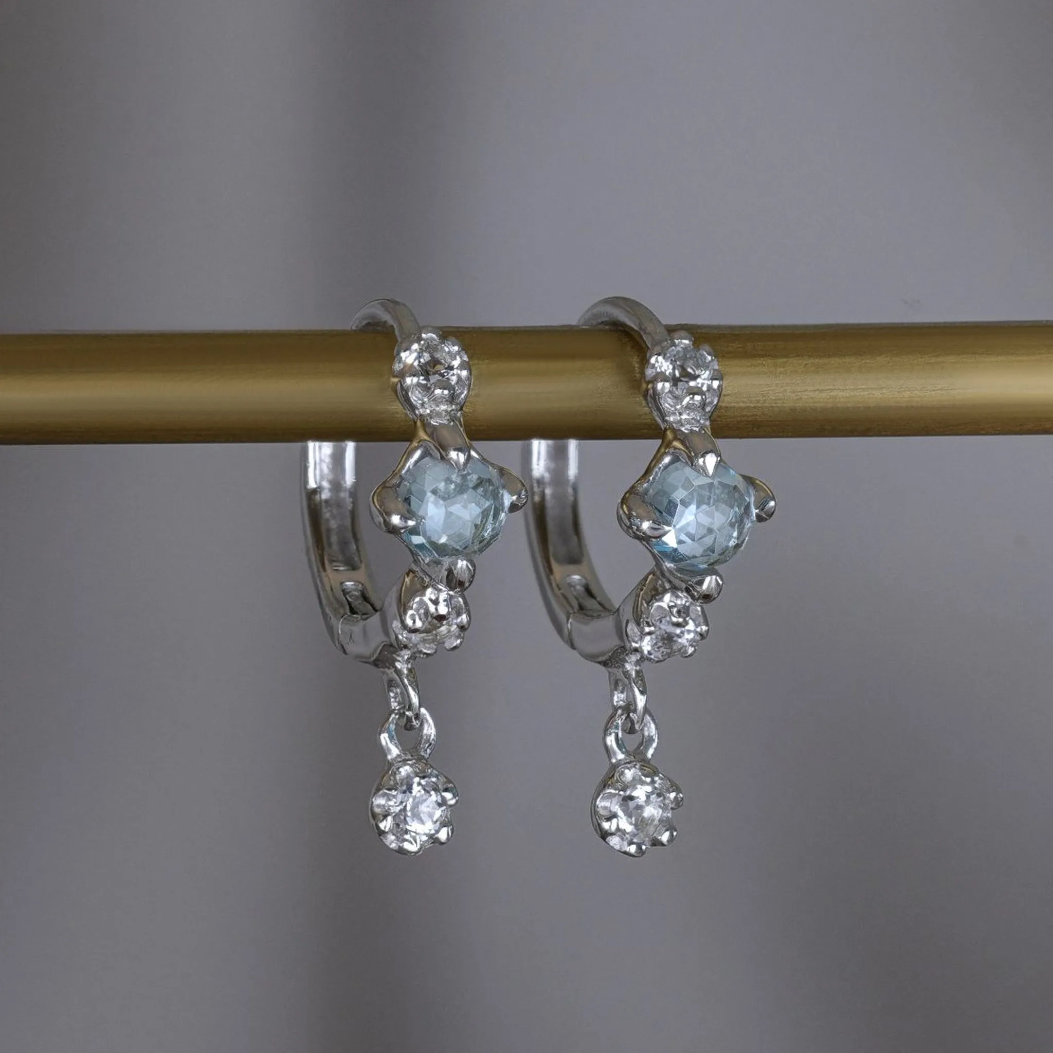 Lucine • Genuine Sky Blue Topaz Hoop Earrings